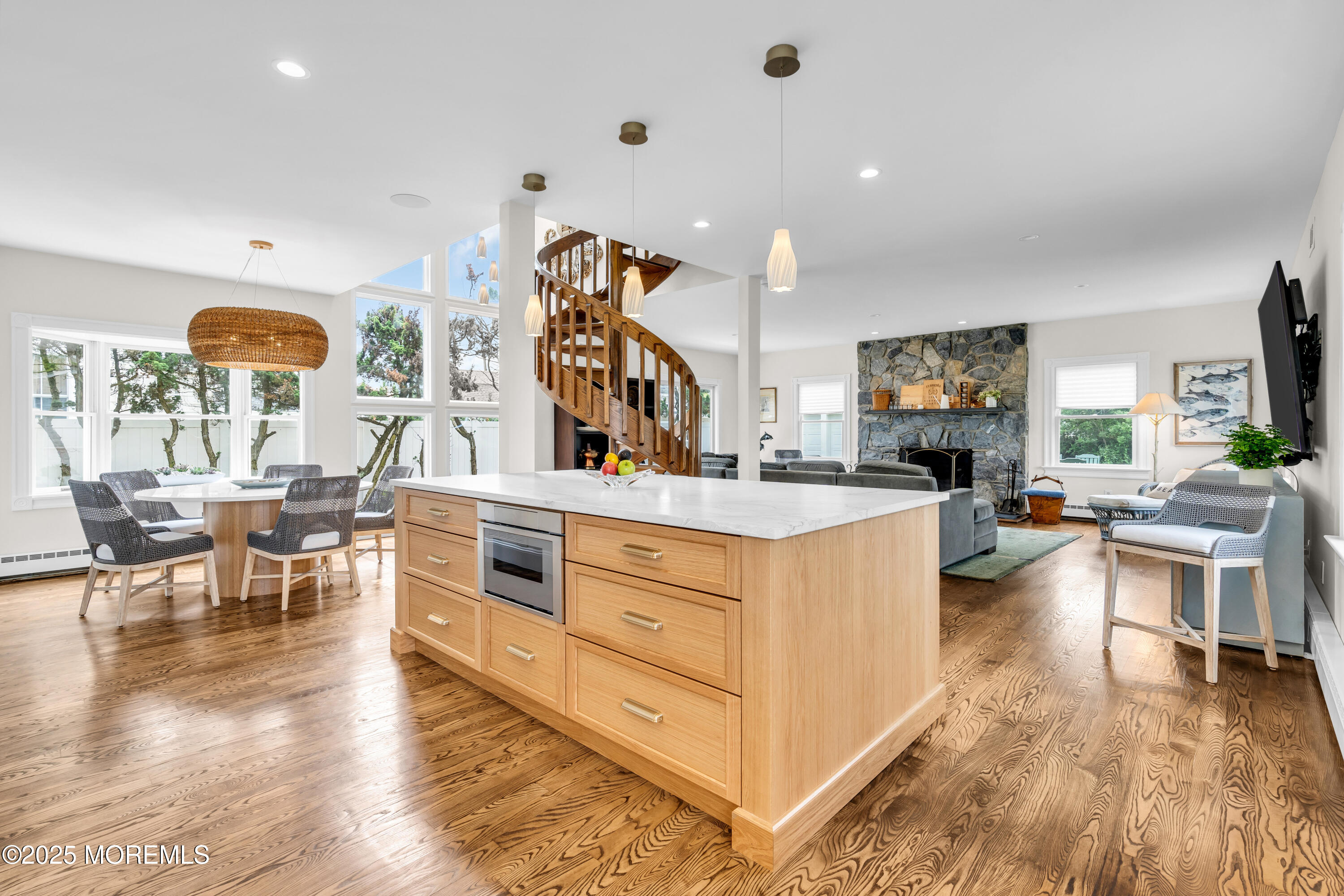 1612 Ocean Avenue Spring Lake, NJ 07762 - Photo 56 of 61 a view of living room with kitchen island furniture and a wooden floor
