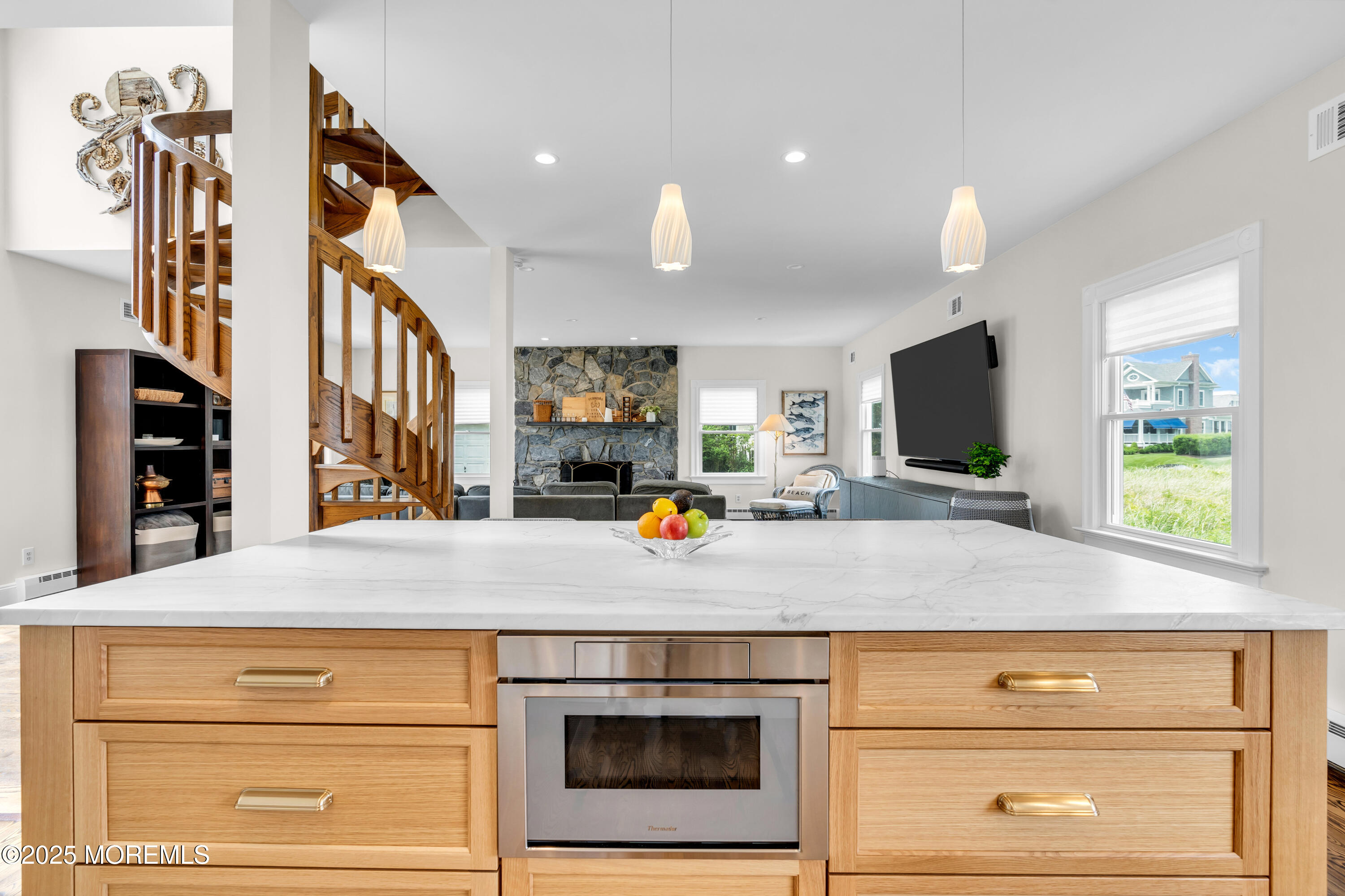 1612 Ocean Avenue Spring Lake, NJ 07762 - Photo 57 of 61 a kitchen with kitchen island granite countertop a stove and a sink