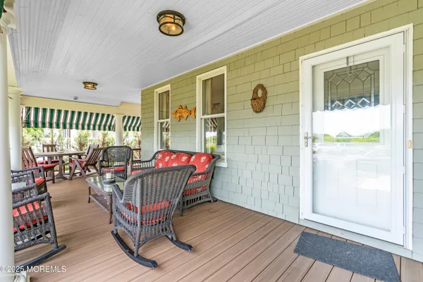 a outdoor space with patio the couches and a potted plant