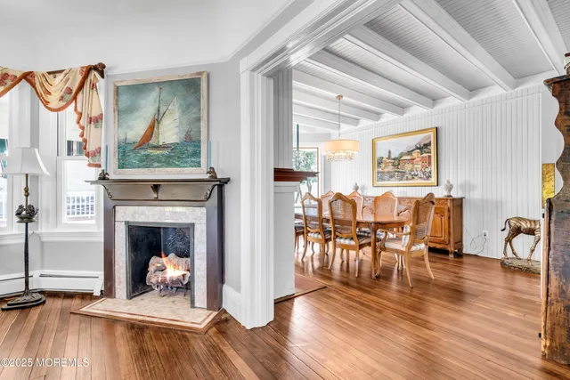 a view of a living room and dining room