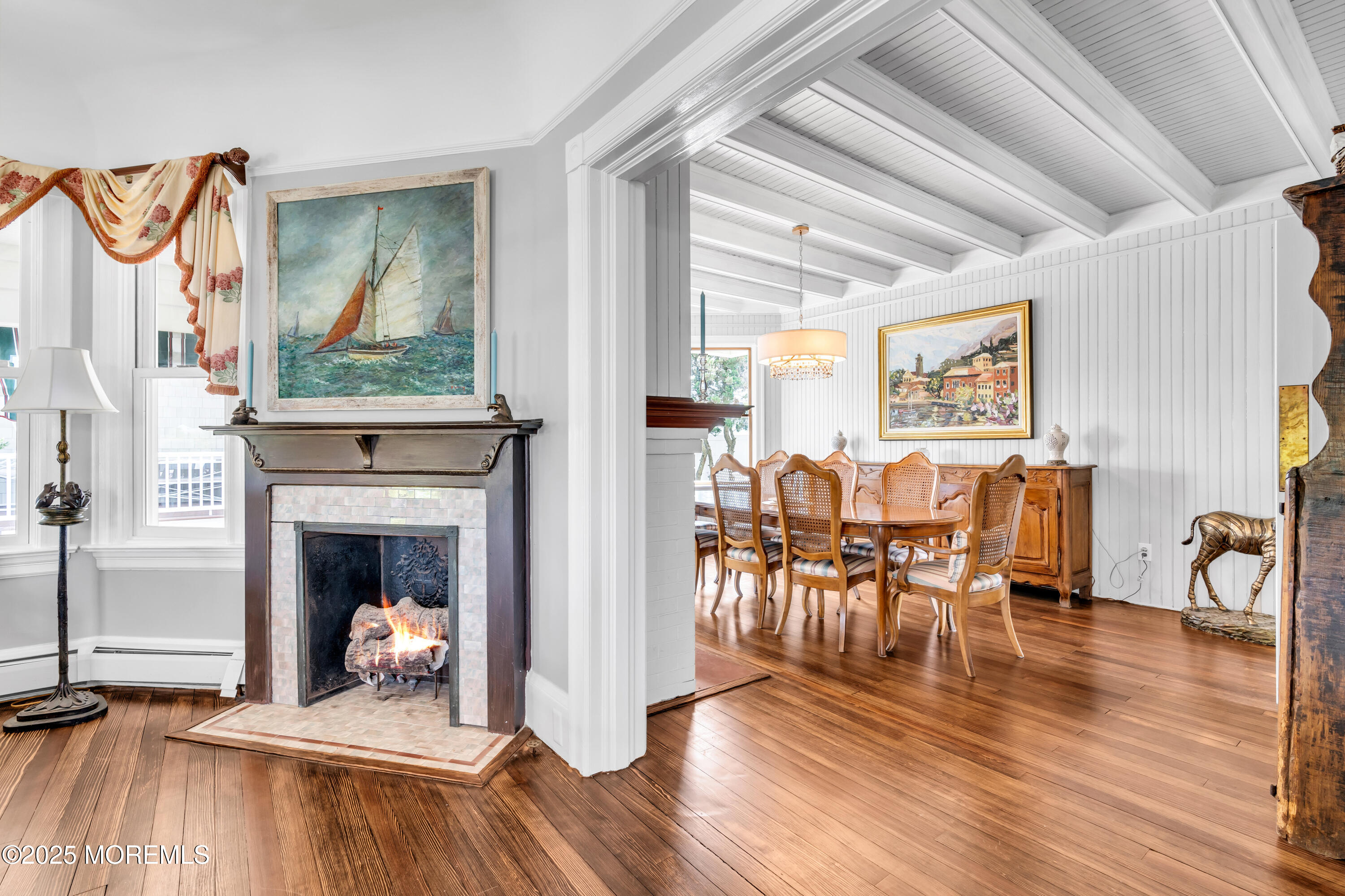 1612 Ocean Avenue Spring Lake, NJ 07762 - Photo 7 of 61 a living room with furniture and a fireplace