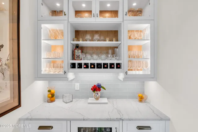 a kitchen with a sink and a large window