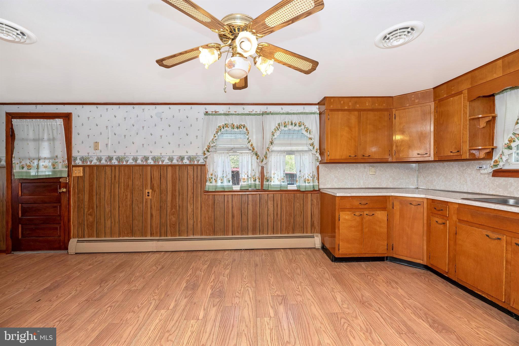 9250 Rocky Ridge Road Rocky Ridge, MD 21778 - Photo 15 of 67 a view of a kitchen with microwave and cabinets