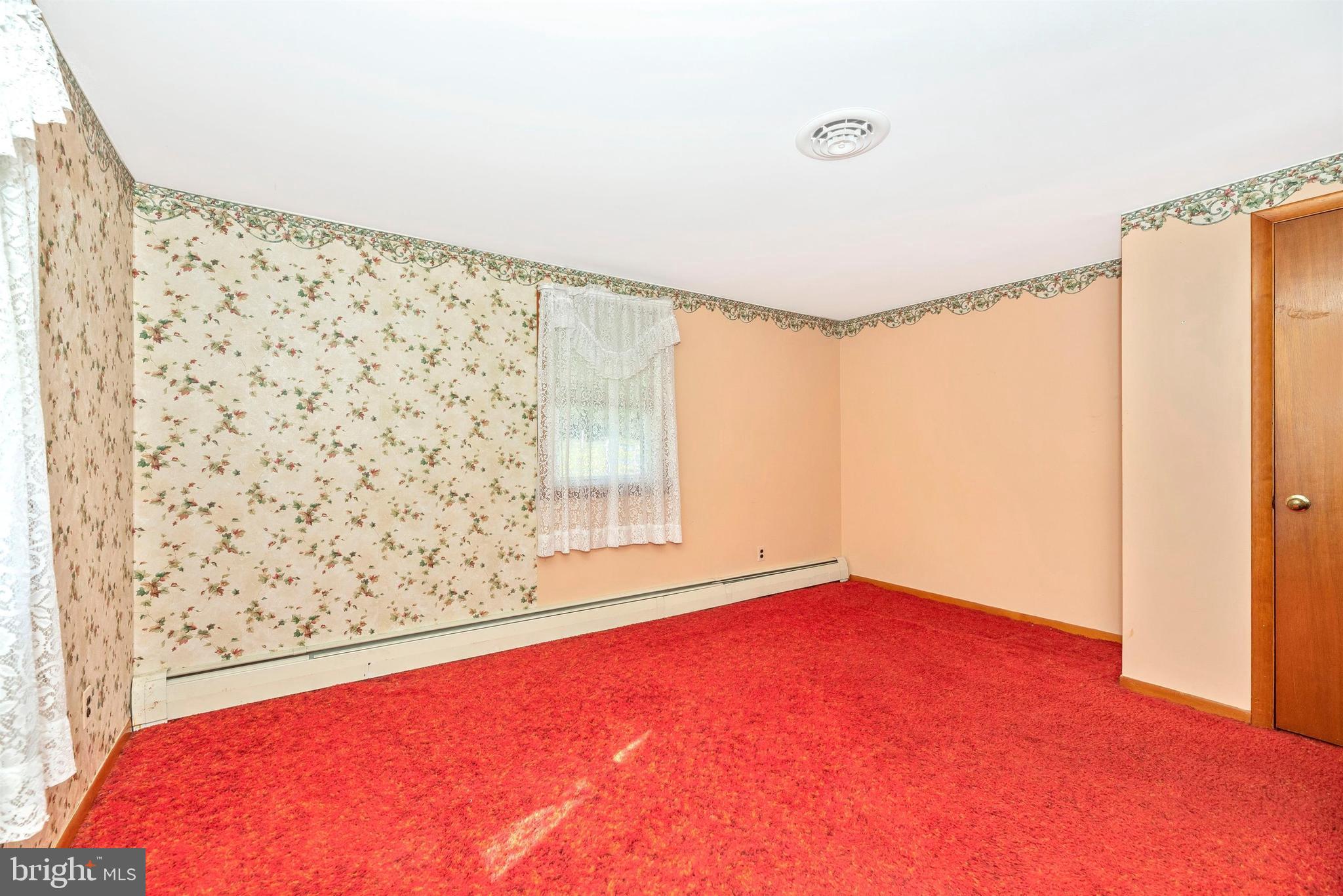 9250 Rocky Ridge Road Rocky Ridge, MD 21778 - Photo 25 of 67 a view of a room with window and a ceiling fan