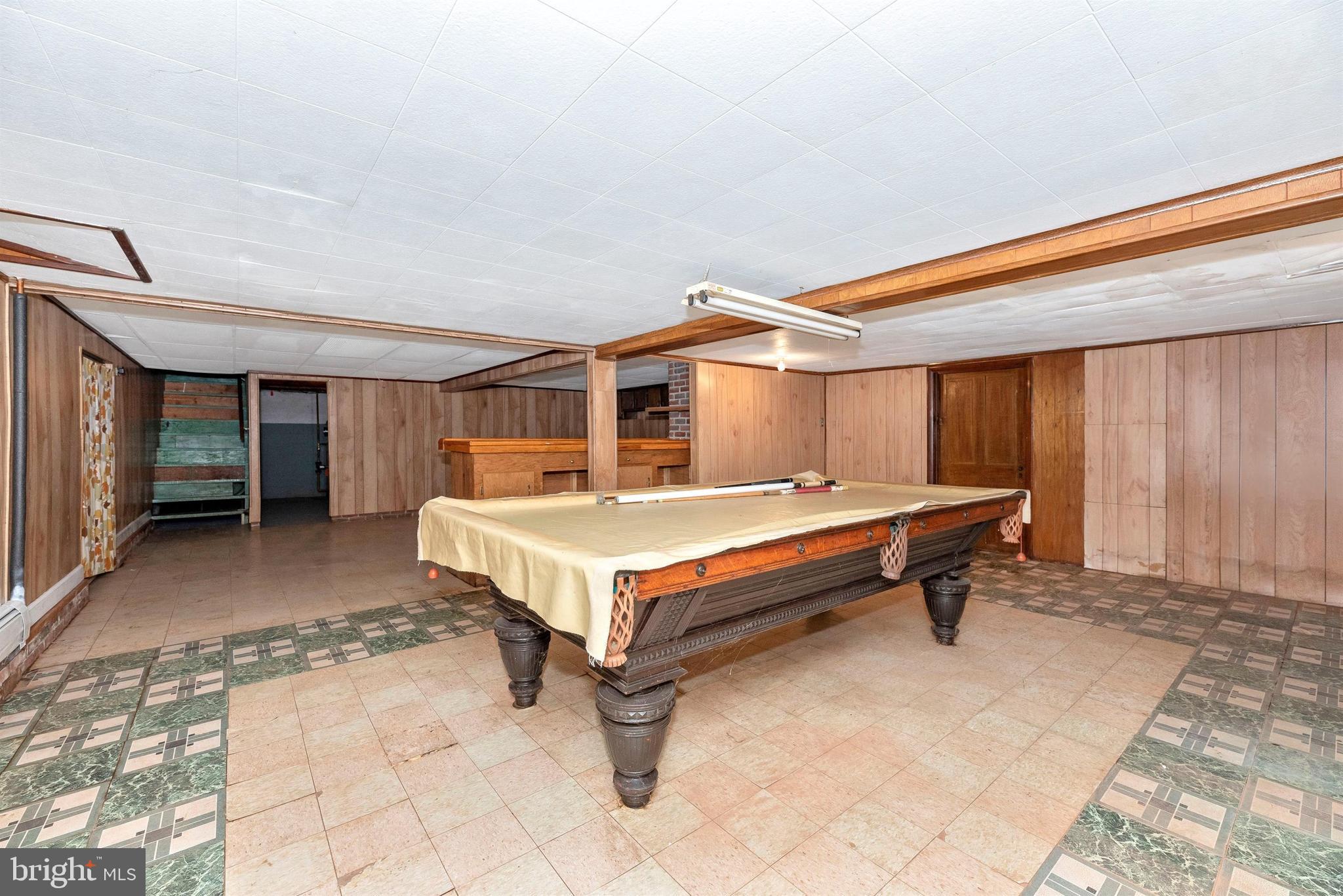 9250 Rocky Ridge Road Rocky Ridge, MD 21778 - Photo 34 of 67 a bedroom with a bed and a table