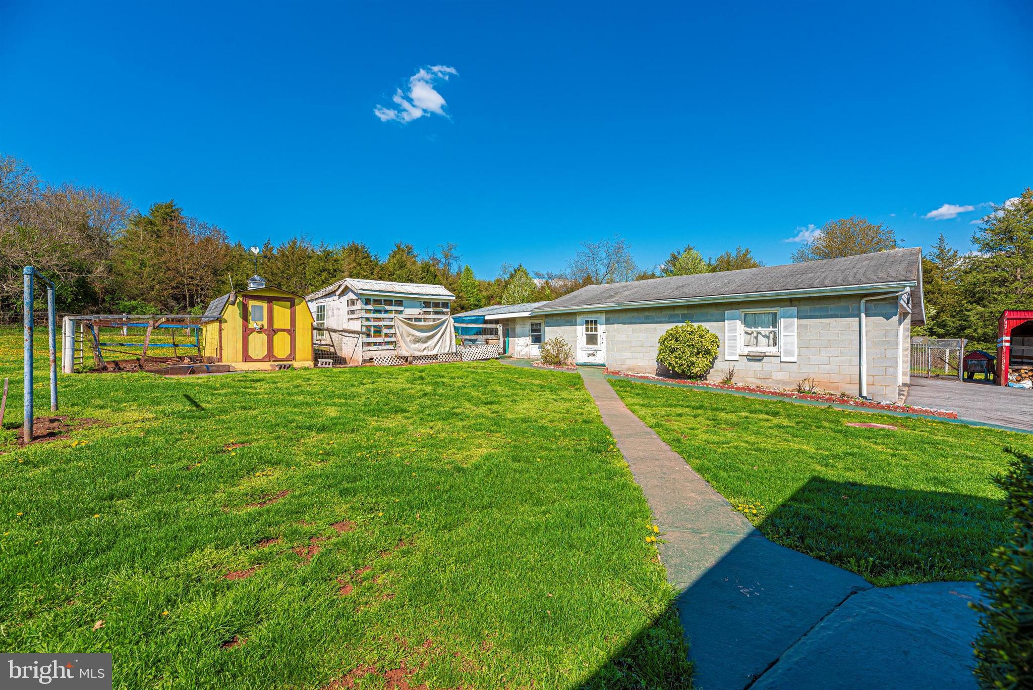 9250 Rocky Ridge Road Rocky Ridge, MD 21778 - Photo 44 of 67 a front view of a house with a yard