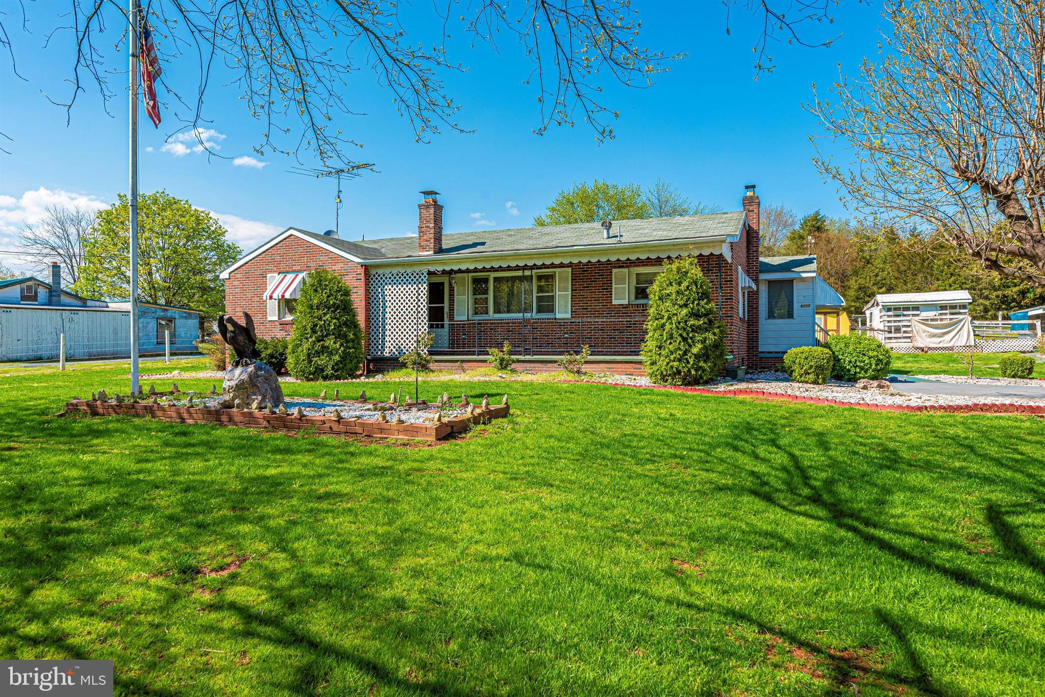 9250 Rocky Ridge Road Rocky Ridge, MD 21778 - Photo 49 of 67 a front view of house with yard and outdoor seating