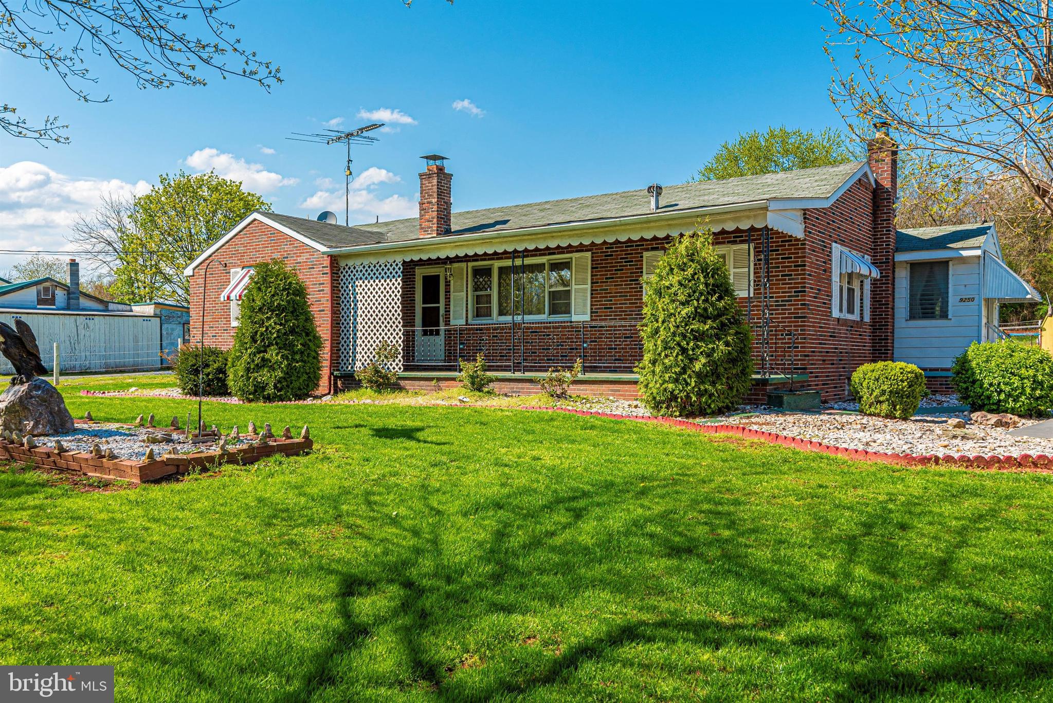 9250 Rocky Ridge Road Rocky Ridge, MD 21778 - Photo 50 of 67 a front view of house with yard and outdoor seating