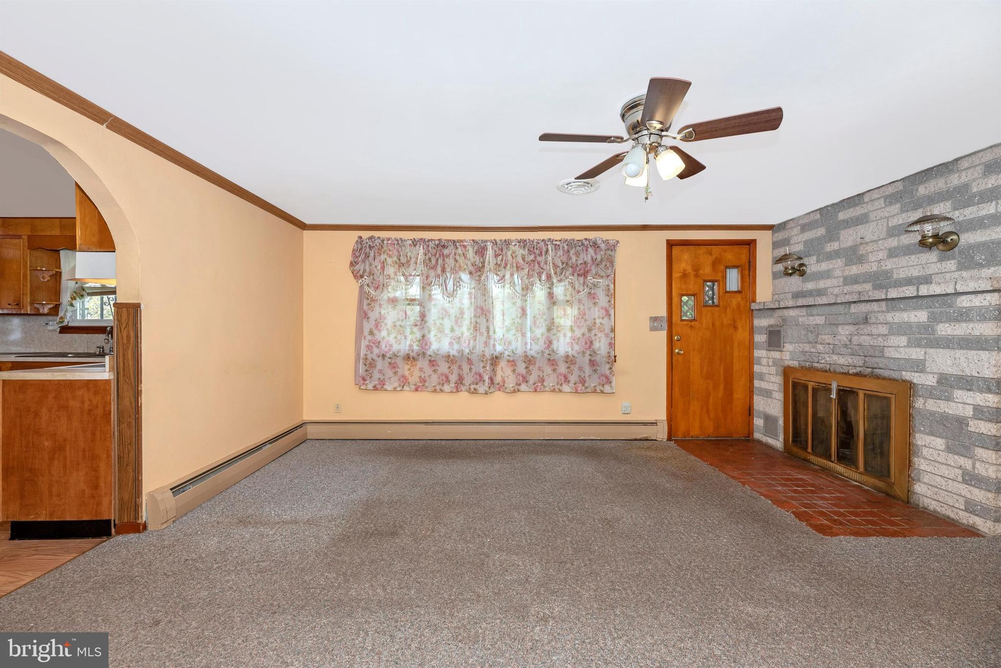 9250 Rocky Ridge Road Rocky Ridge, MD 21778 - Photo 7 of 67 a view of empty room with a fireplace