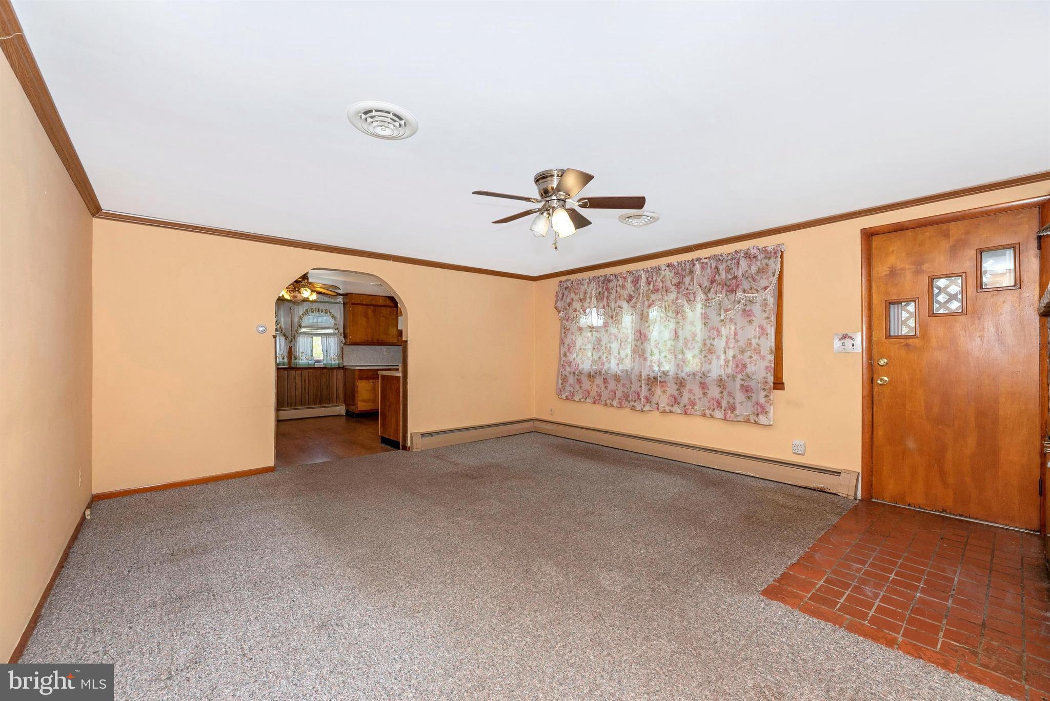 9250 Rocky Ridge Road Rocky Ridge, MD 21778 - Photo 9 of 67 an empty room with windows