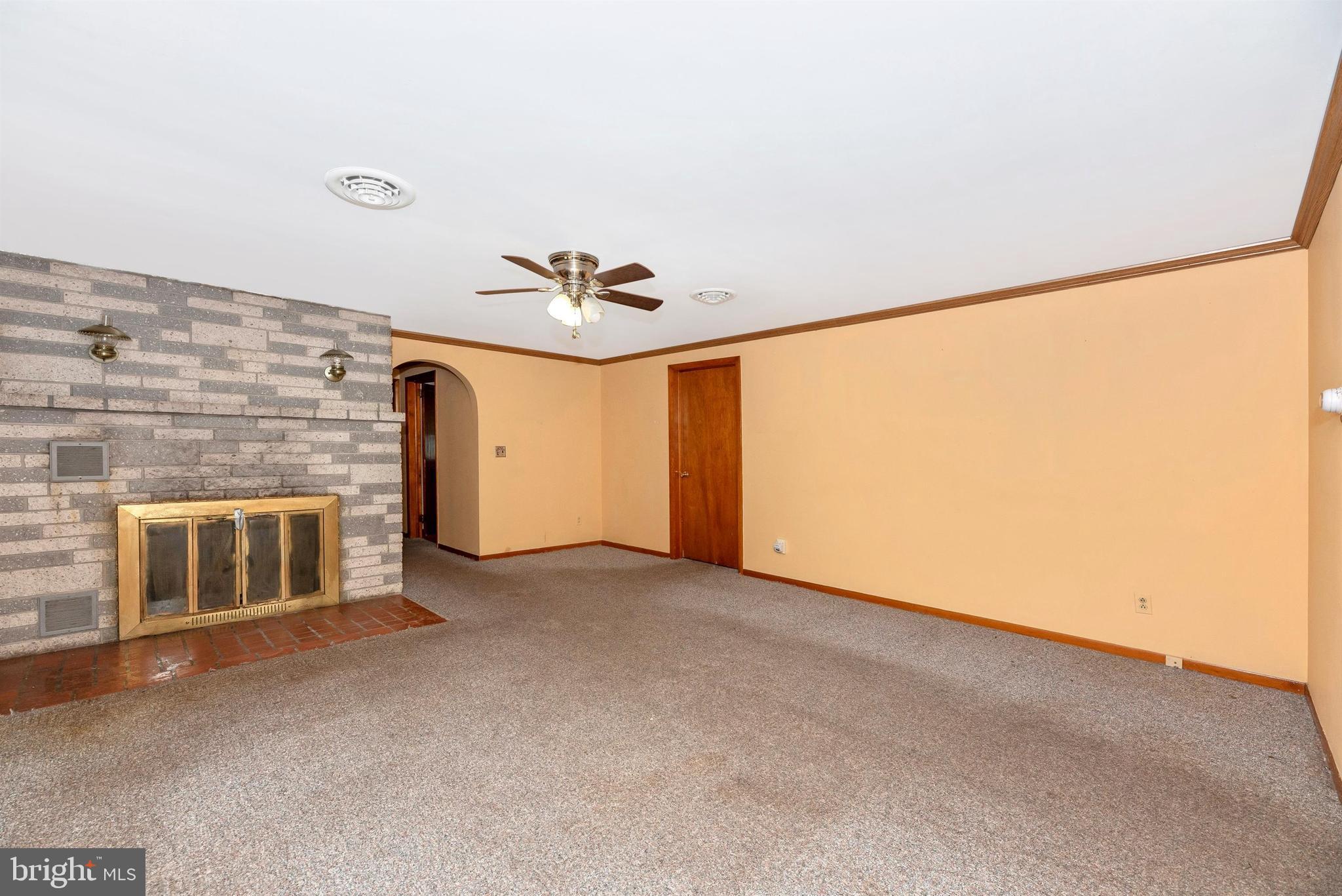 9250 Rocky Ridge Road Rocky Ridge, MD 21778 - Photo 10 of 67 a view of a livingroom with a fireplace
