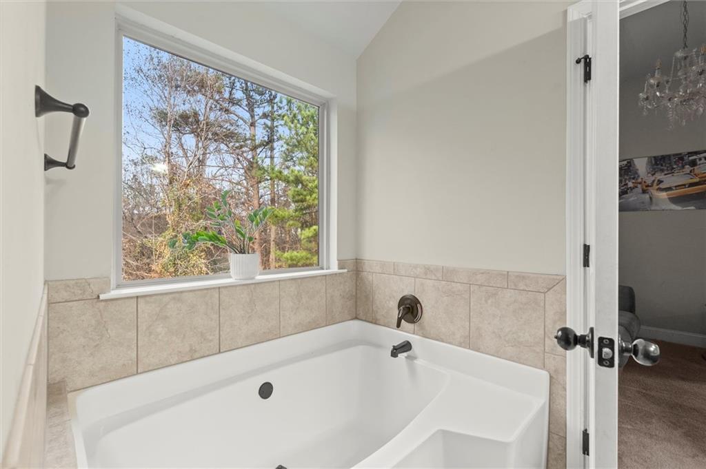 4940 Longview Run Decatur, GA 30035 - Photo 15 of 21 a white bath tub sitting next to a window