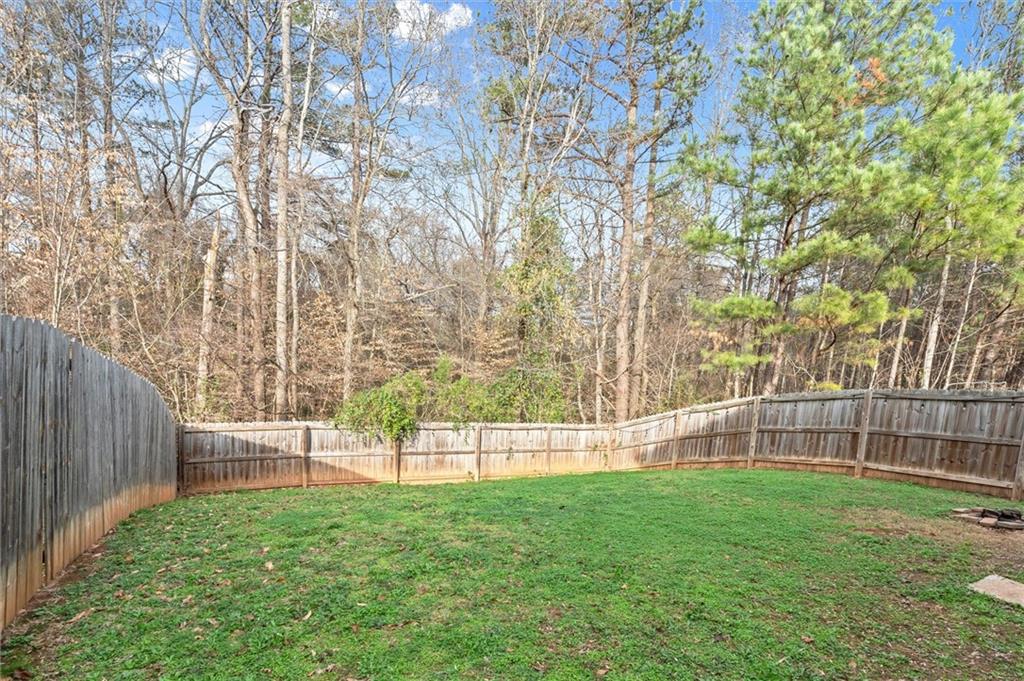 4940 Longview Run Decatur, GA 30035 - Photo 21 of 21 a view of yard with grass and wooden fence
