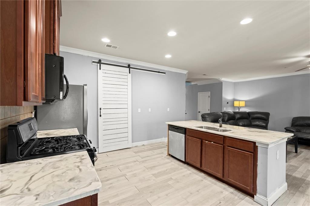 4940 Longview Run Decatur, GA 30035 - Photo 7 of 21 a kitchen with a stove and a refrigerator
