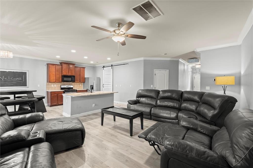 4940 Longview Run Decatur, GA 30035 - Photo 8 of 21 a living room with furniture and kitchen view