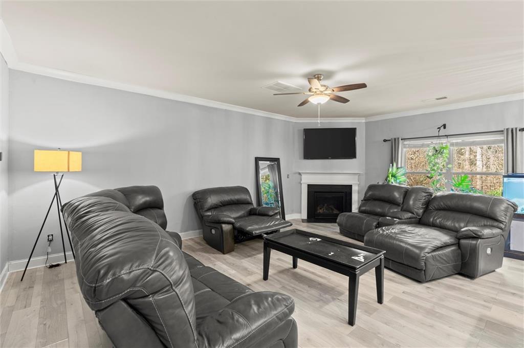 4940 Longview Run Decatur, GA 30035 - Photo 10 of 21 a living room with furniture and a fireplace