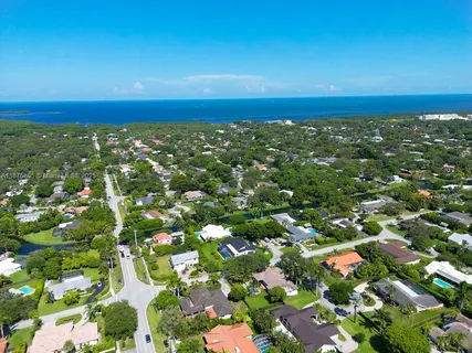 a view of city with an ocean