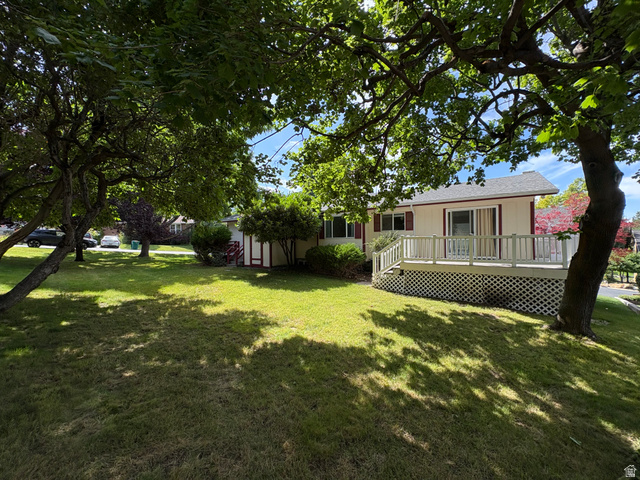 595 Meadowlark Road Orem, UT 84097 - Photo 73 of 87 Expansive front yard with mature trees providing natural shade