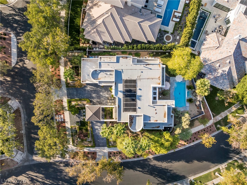 2000 Grouse Street Las Vegas, NV 89134 - Photo 84 of 89 An aerial perspective showcases a modern estate with private swimming pool and abundant outdoor living space.