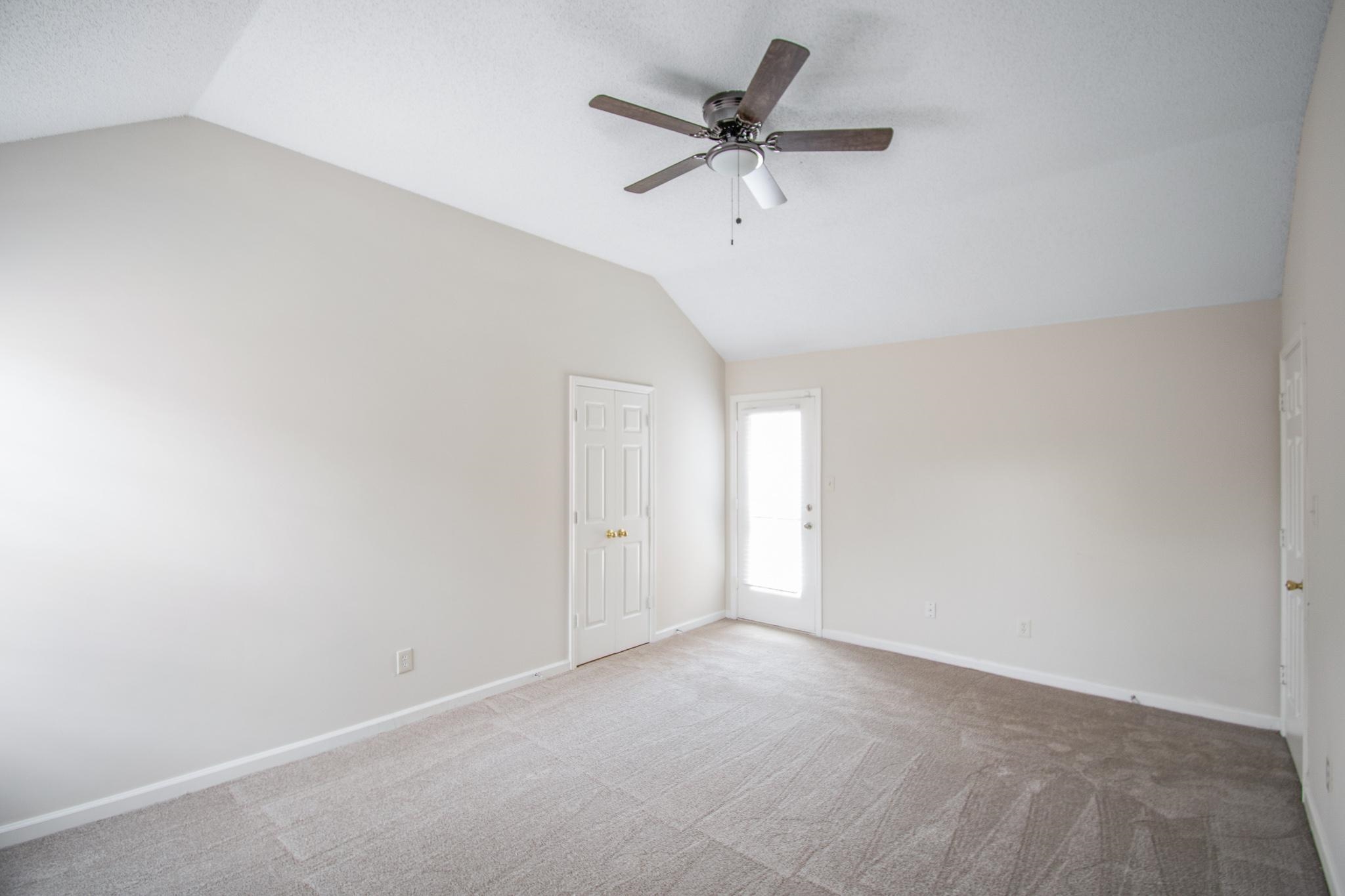 6909 Finch Road Memphis, TN 38141 - Photo 10 of 20 a view of a big room with carpet