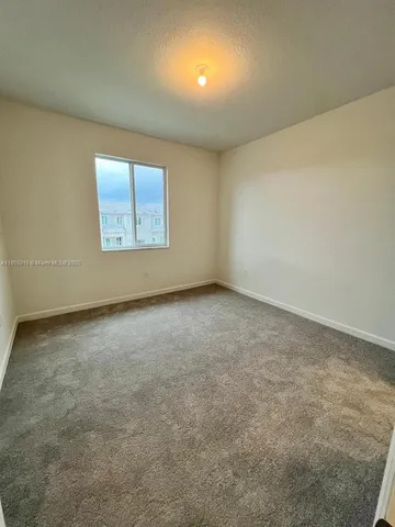 an empty room with closet