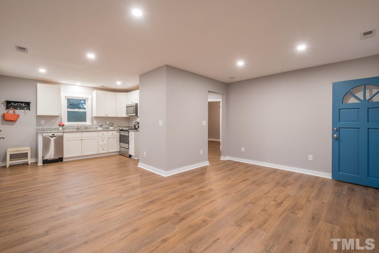166 Hannah Creek Road Four Oaks, NC 27524 - Photo 7 of 20 a view of kitchen with wooden floor