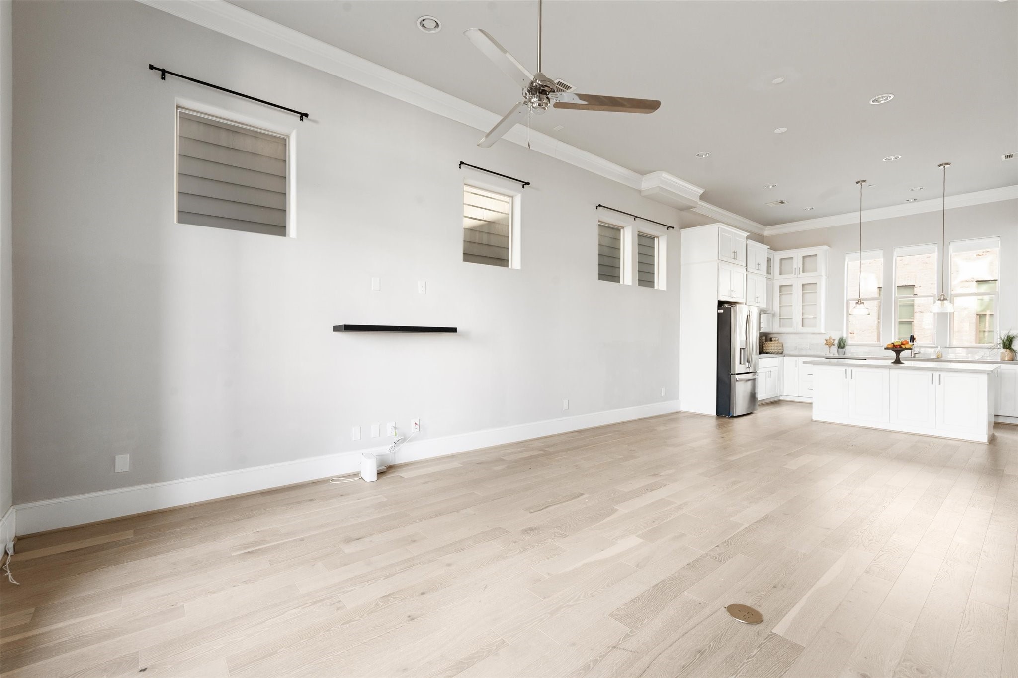 1005 St Charles Street Houston, TX 77003 - Photo 17 of 27 a view of a kitchen with wooden floor and a window