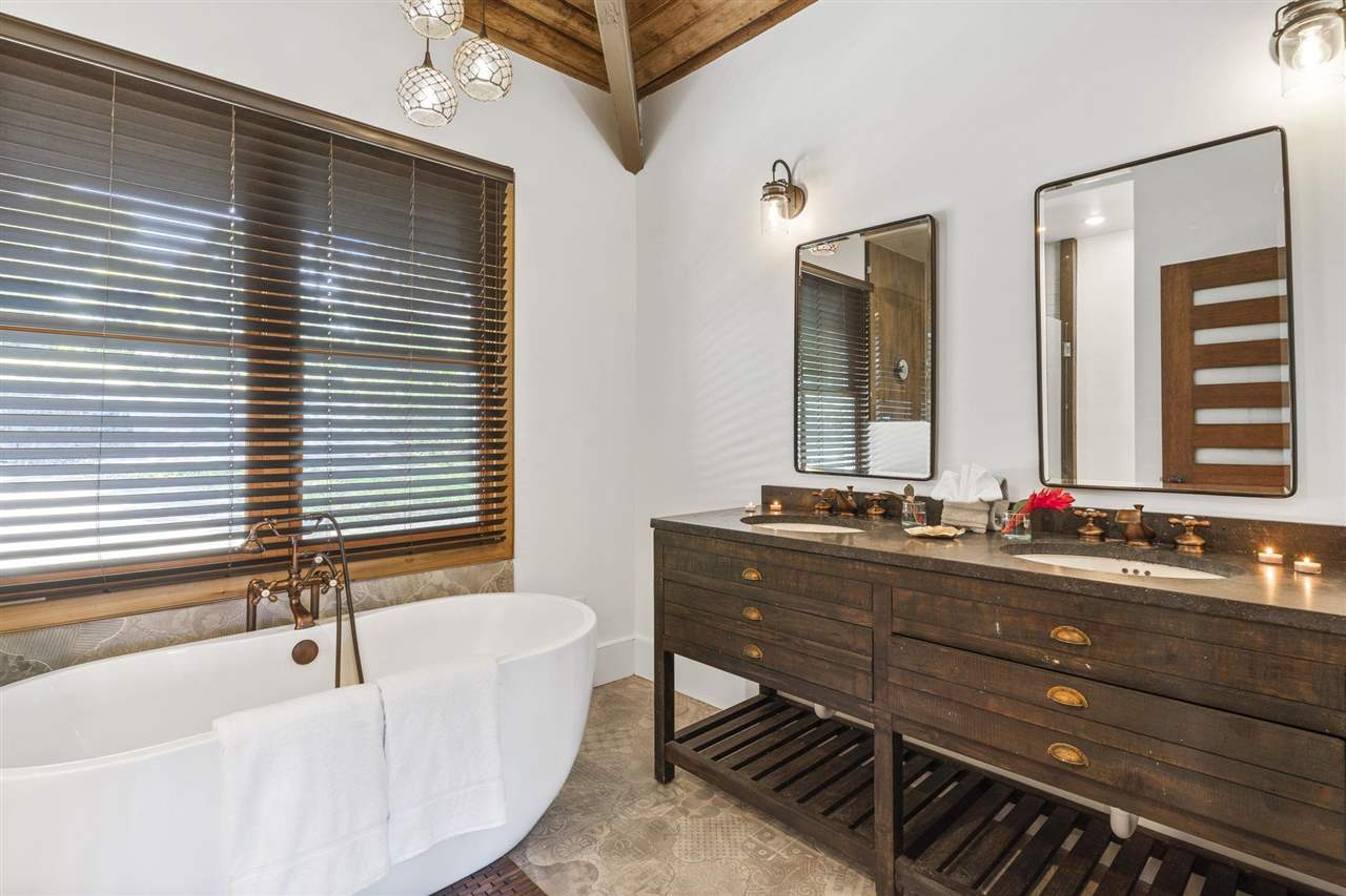 2560 Kokomo Road Haiku, HI 96708 - Photo 6 of 30 a bathroom with a bathtub and a sink