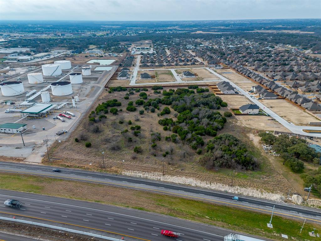 20 South Service Road Aledo, TX 76008 - Photo 3 of 16 a view of a lake with big yard