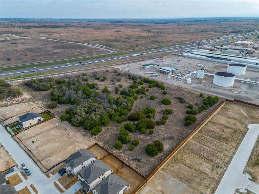 20 South Service Road Aledo, TX 76008 - Photo 5 of 16 a view of an outdoor space with wooden floor