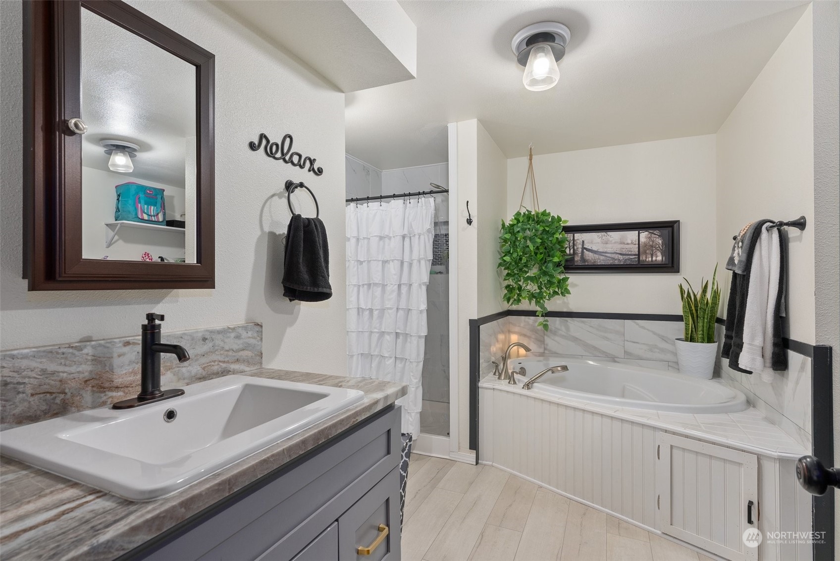 454 Harmon Road, Unit 11 Chehalis, WA 98532 - Photo 15 of 28 a bathroom with a sink and a mirror