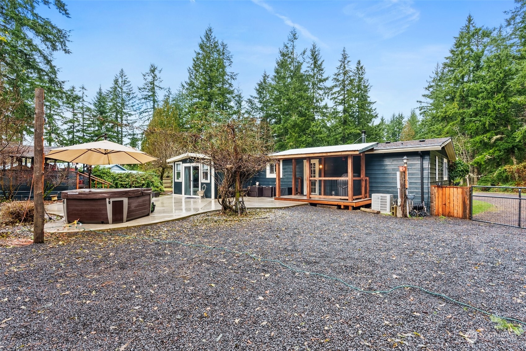 454 Harmon Road, Unit 11 Chehalis, WA 98532 - Photo 24 of 28 a view of a house with backyard and sitting area