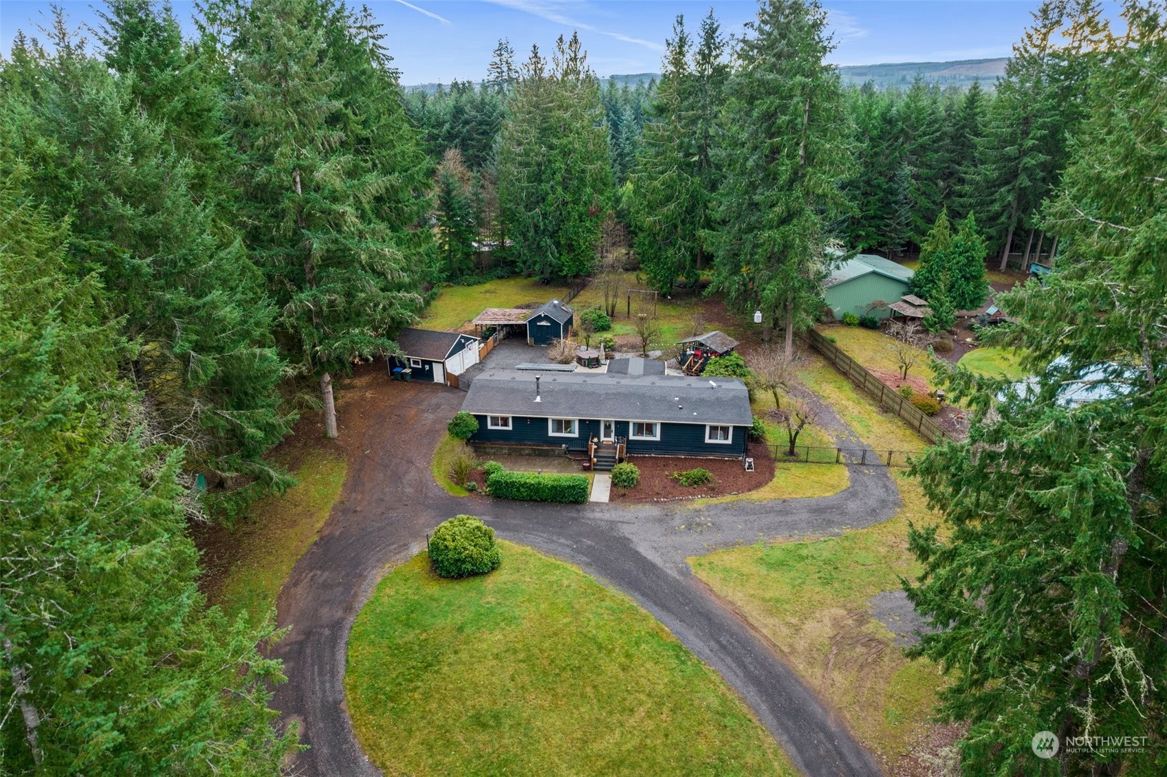 454 Harmon Road, Unit 11 Chehalis, WA 98532 - Photo 27 of 28 an aerial view of a house with swimming pool big yard and large trees