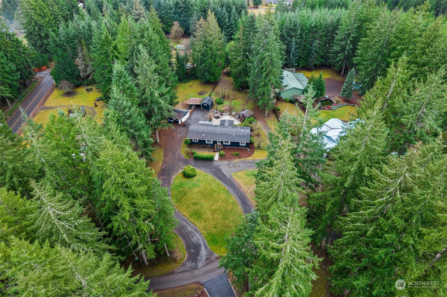 454 Harmon Road, Unit 11 Chehalis, WA 98532 - Photo 28 of 28 an aerial view of a house with swimming pool a yard and outdoor seating