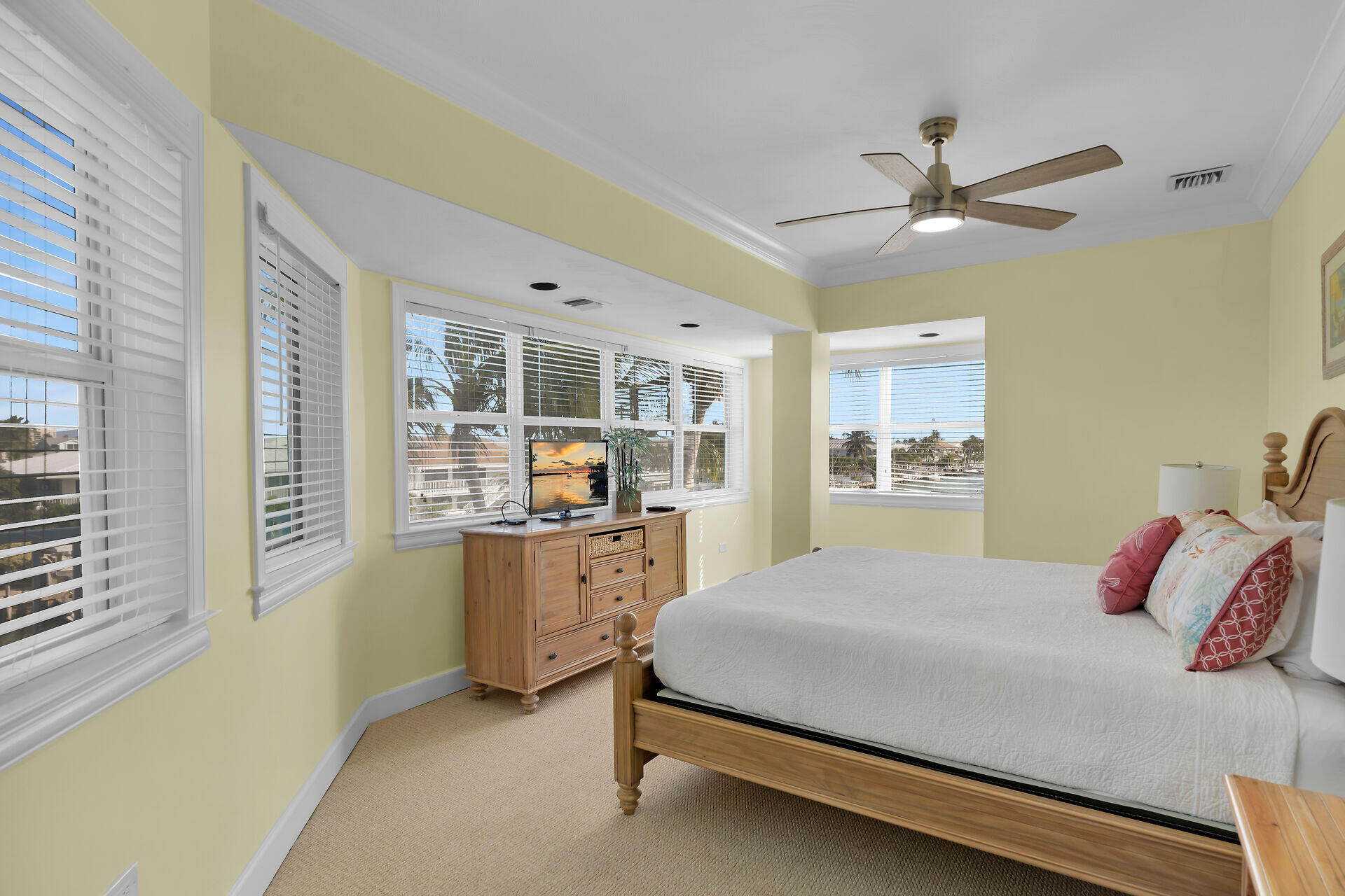 580-590 10th Street Key Colony Beach, FL 33051 - Photo 26 of 75 a bedroom with a large bed and a window