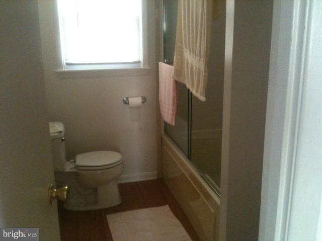 1304 Gresham Road Silver Spring, MD 20904 - Photo 5 of 7 a bathroom with a toilet and a sink