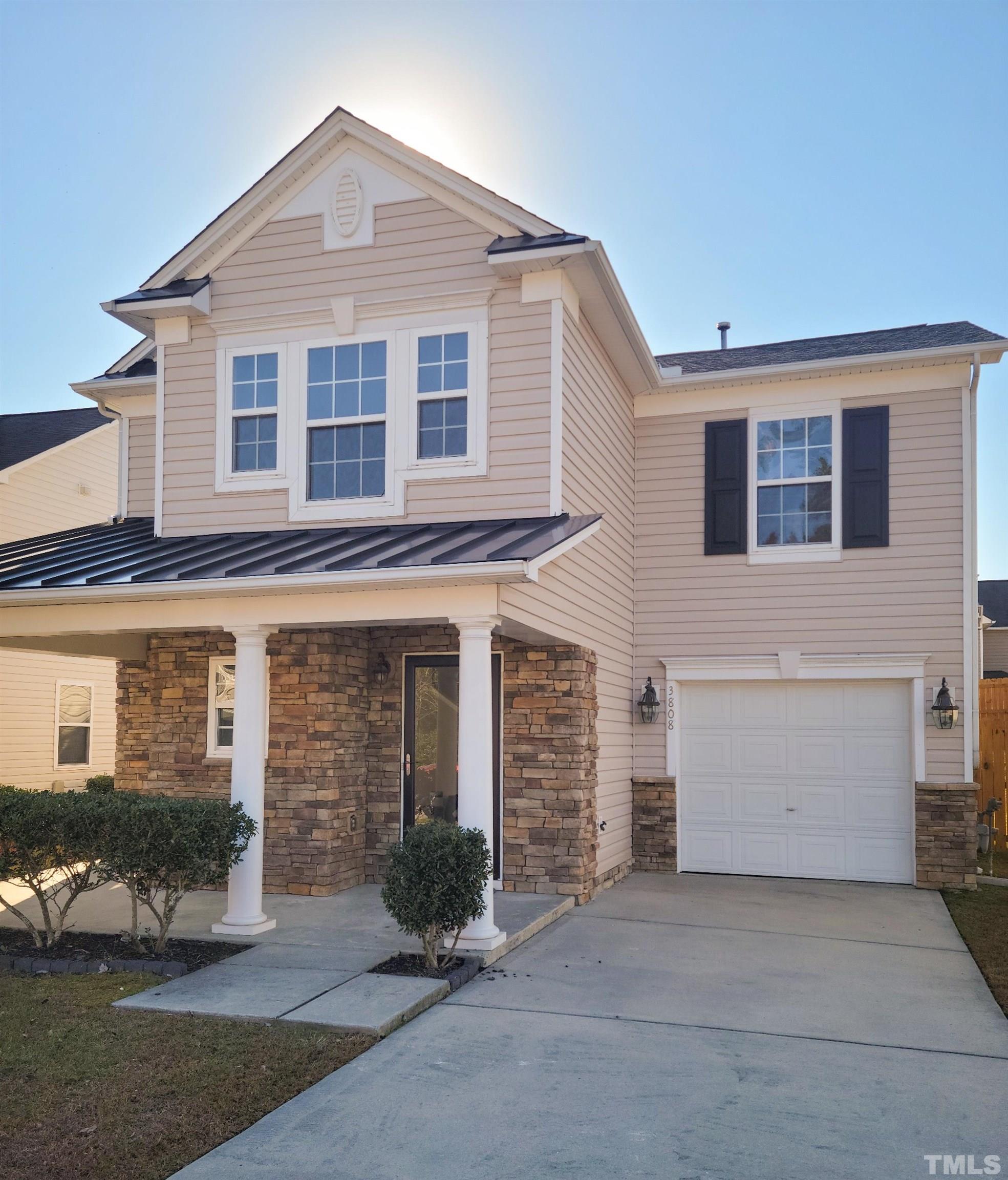 3808 Tryon Ridge Drive Raleigh, NC 27610 - Photo 1 of 30 a view of a house with a yard and large parking space