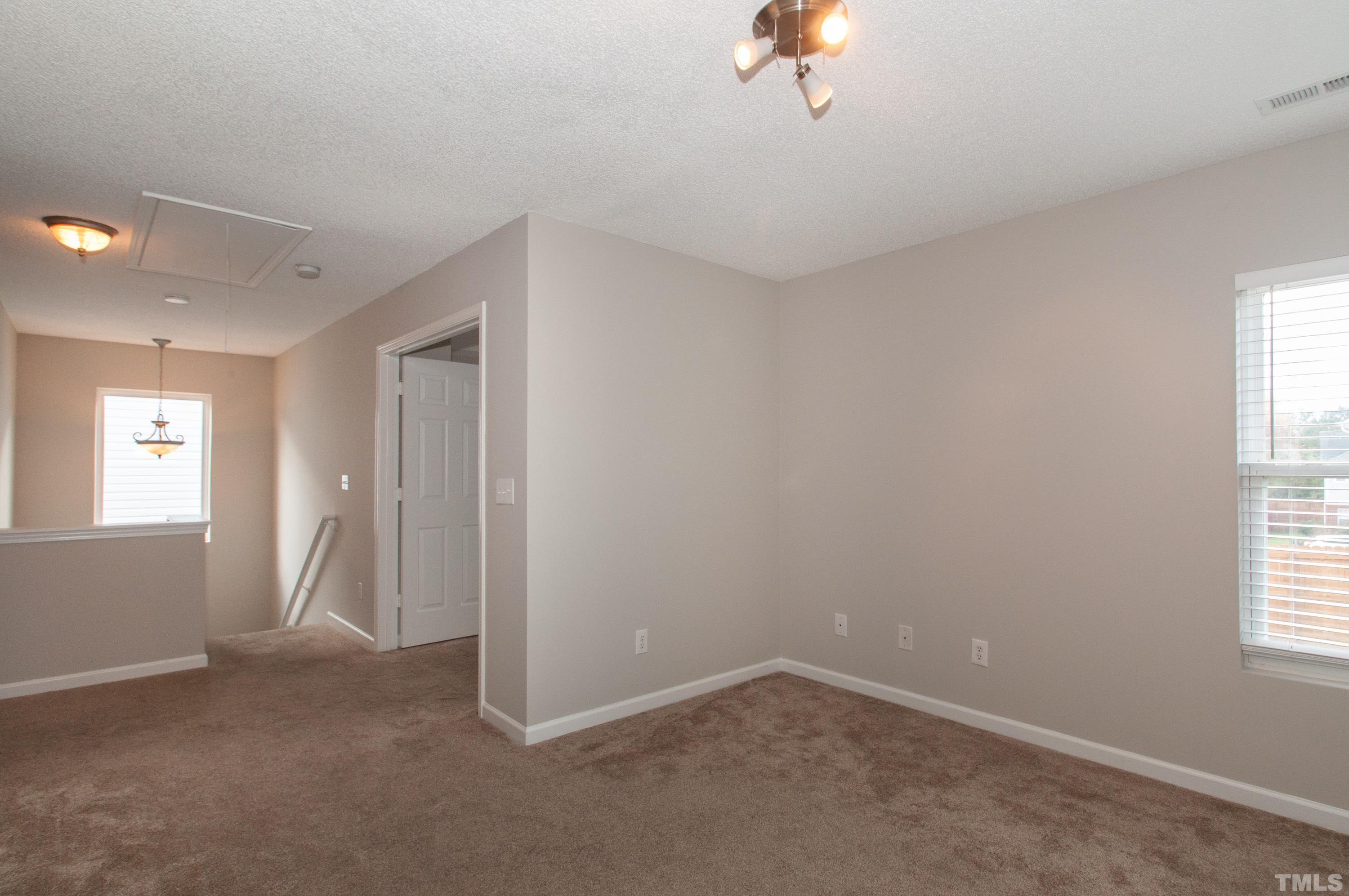 3808 Tryon Ridge Drive Raleigh, NC 27610 - Photo 15 of 30 a view of empty room with window