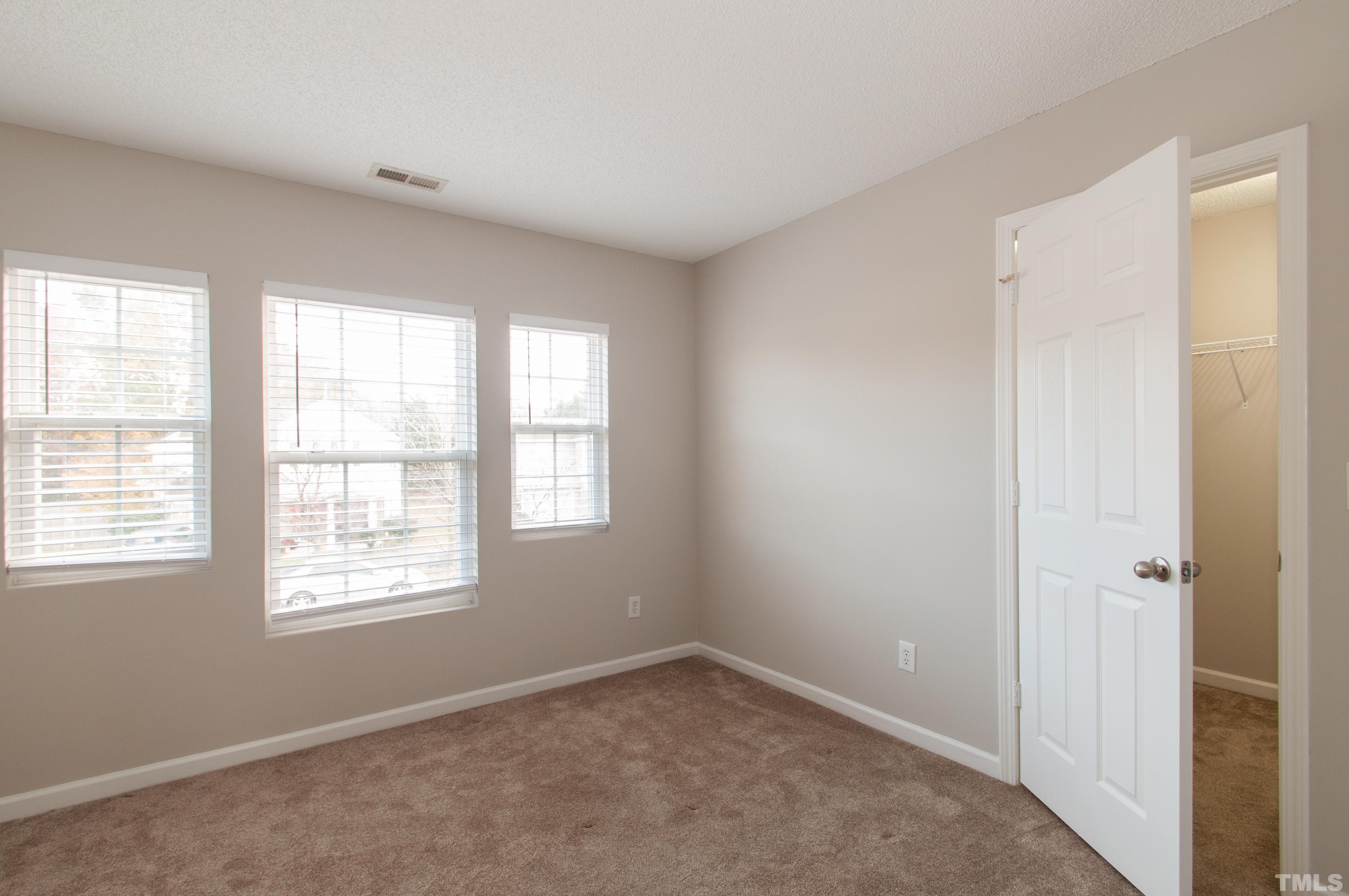 3808 Tryon Ridge Drive Raleigh, NC 27610 - Photo 18 of 30 a view of an empty room with a window