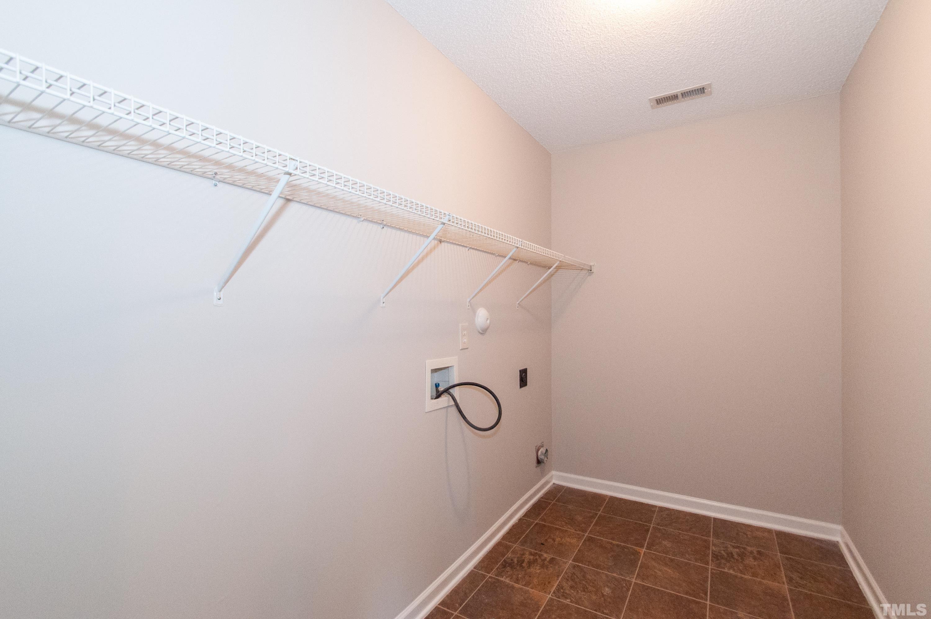 3808 Tryon Ridge Drive Raleigh, NC 27610 - Photo 21 of 30 a view of utility room