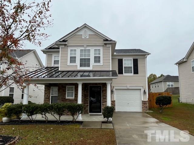 3808 Tryon Ridge Drive Raleigh, NC 27610 - Photo 4 of 30 a front view of a house with garden