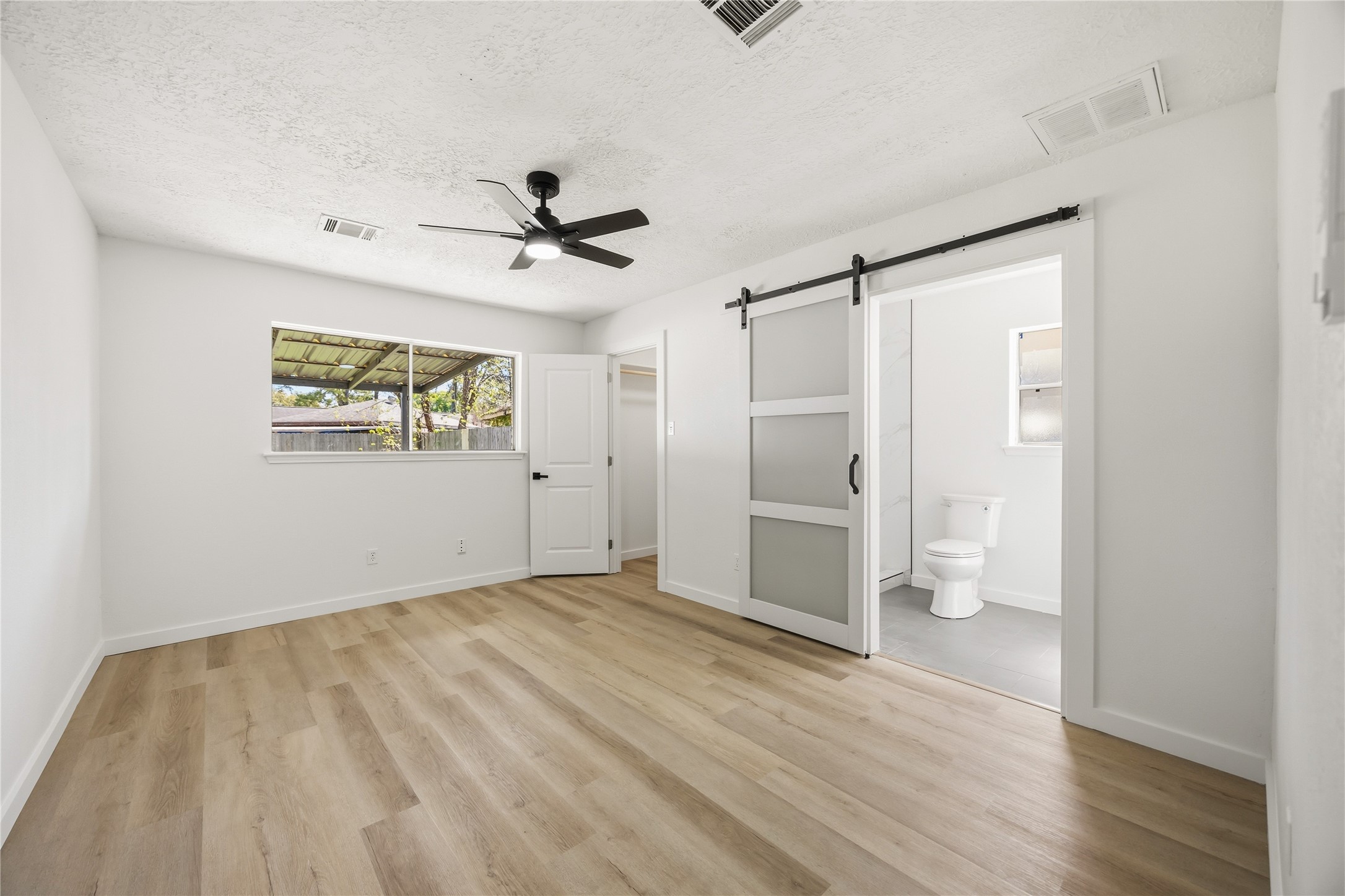23222 Earlmist Drive Spring, TX 77373 - Photo 12 of 28 Primary bedroom with walk in closet and en suite bath
