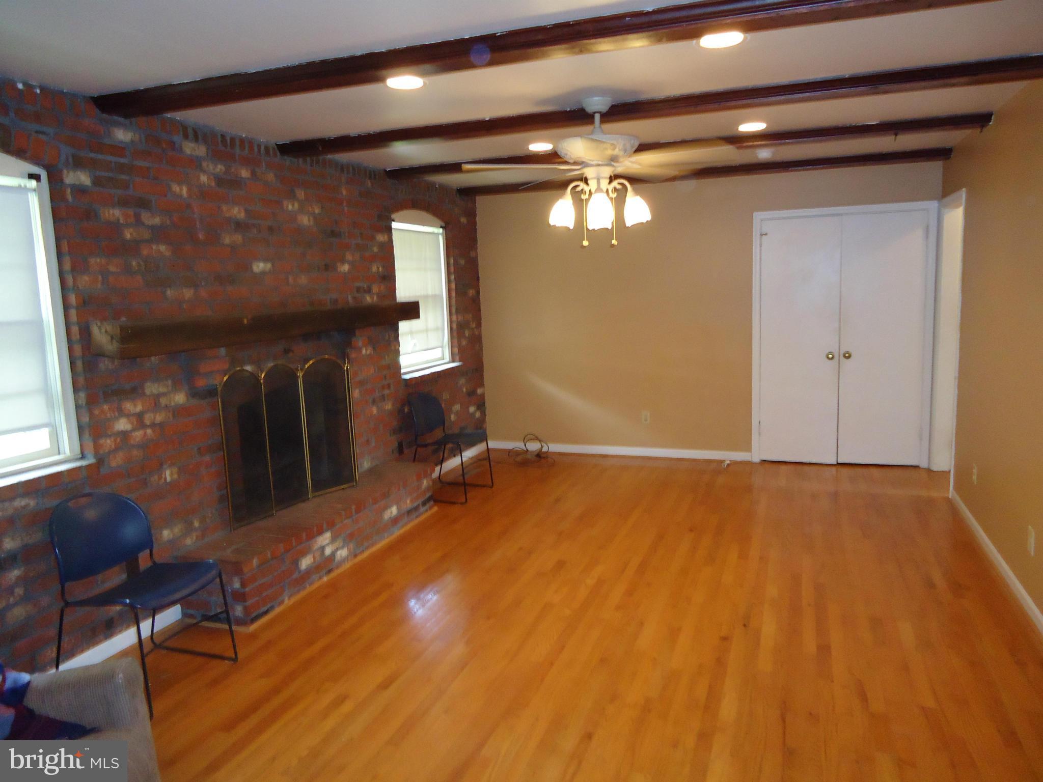 17411 Conoy Road Barnesville, MD 20838 - Photo 8 of 17 a view of an empty room with a chandelier