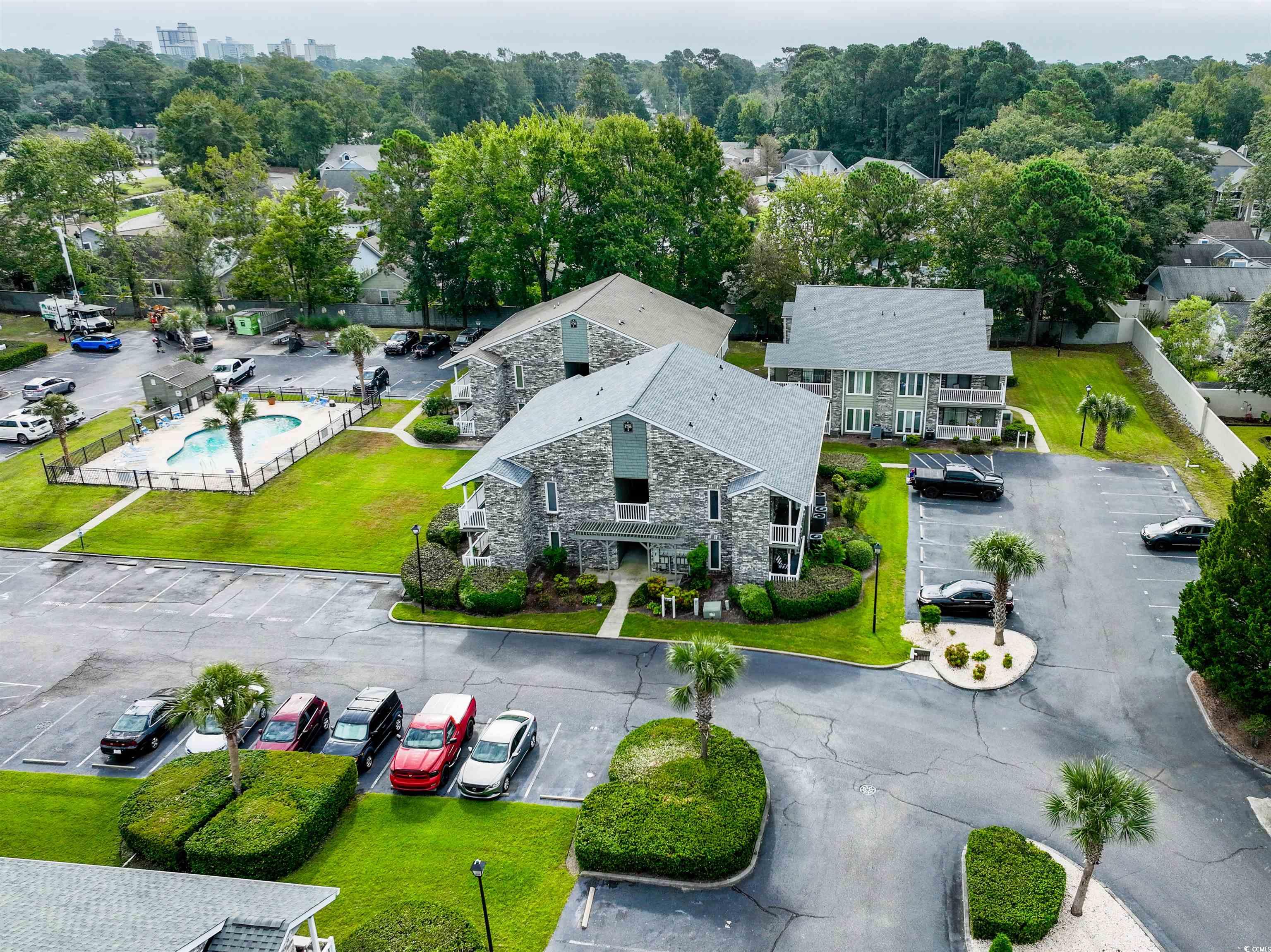 4708 Cobblestone Drive, Unit I8 Myrtle Beach, SC 29577 - Photo 3 of 15 Aerial view of a pool area