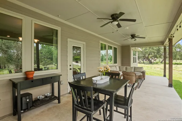 a view of outdoor space with trees all around