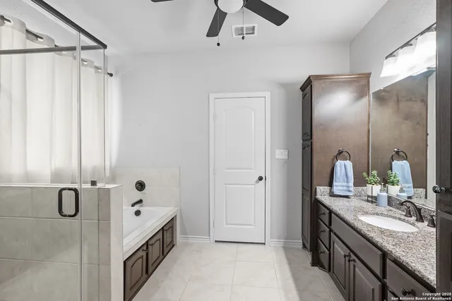 a kids room with toys and a chandelier