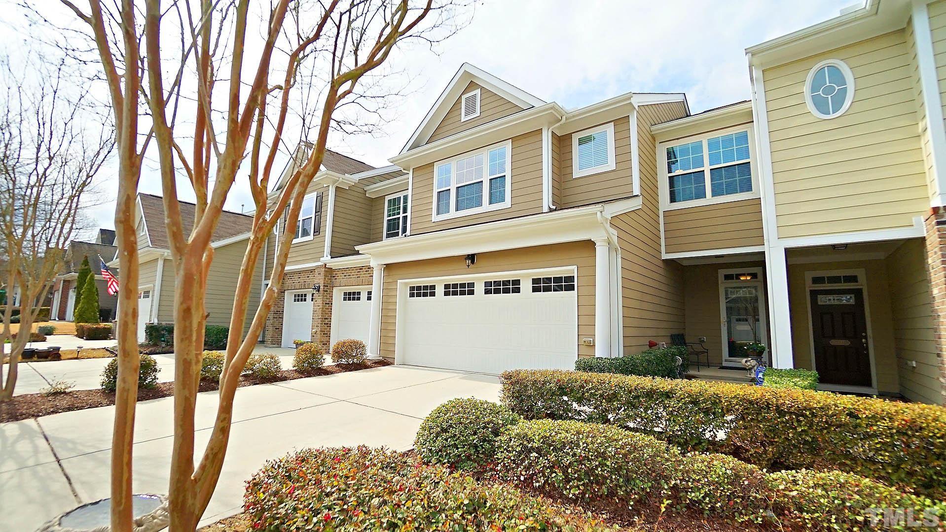10115 Barnhart Way Raleigh, NC 27617 - Photo 58 of 60 a front view of a house with a yard