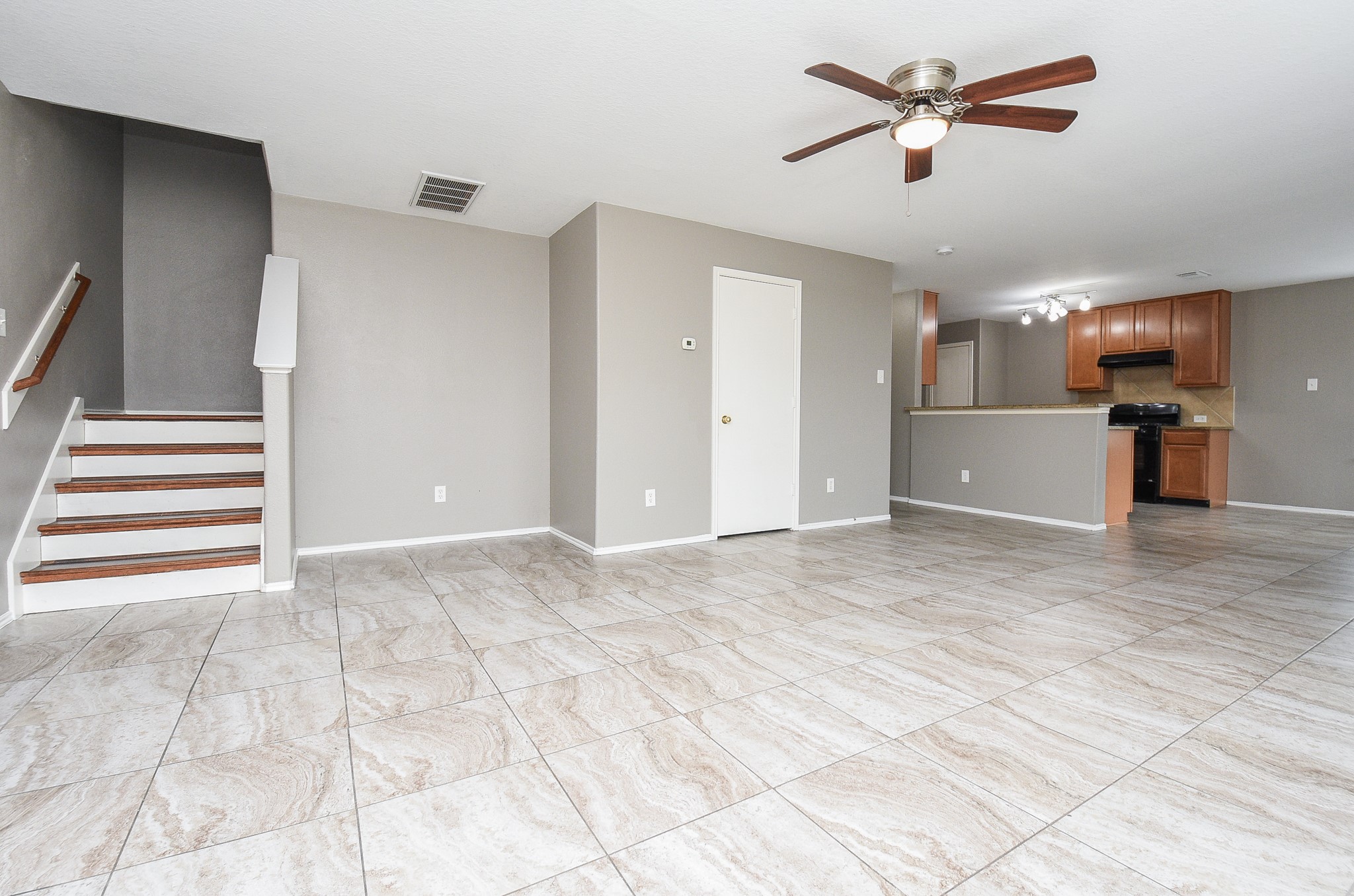 642 Kiley Drive Houston, TX 77073 - Photo 14 of 24 a view of a livingroom with a ceiling fan