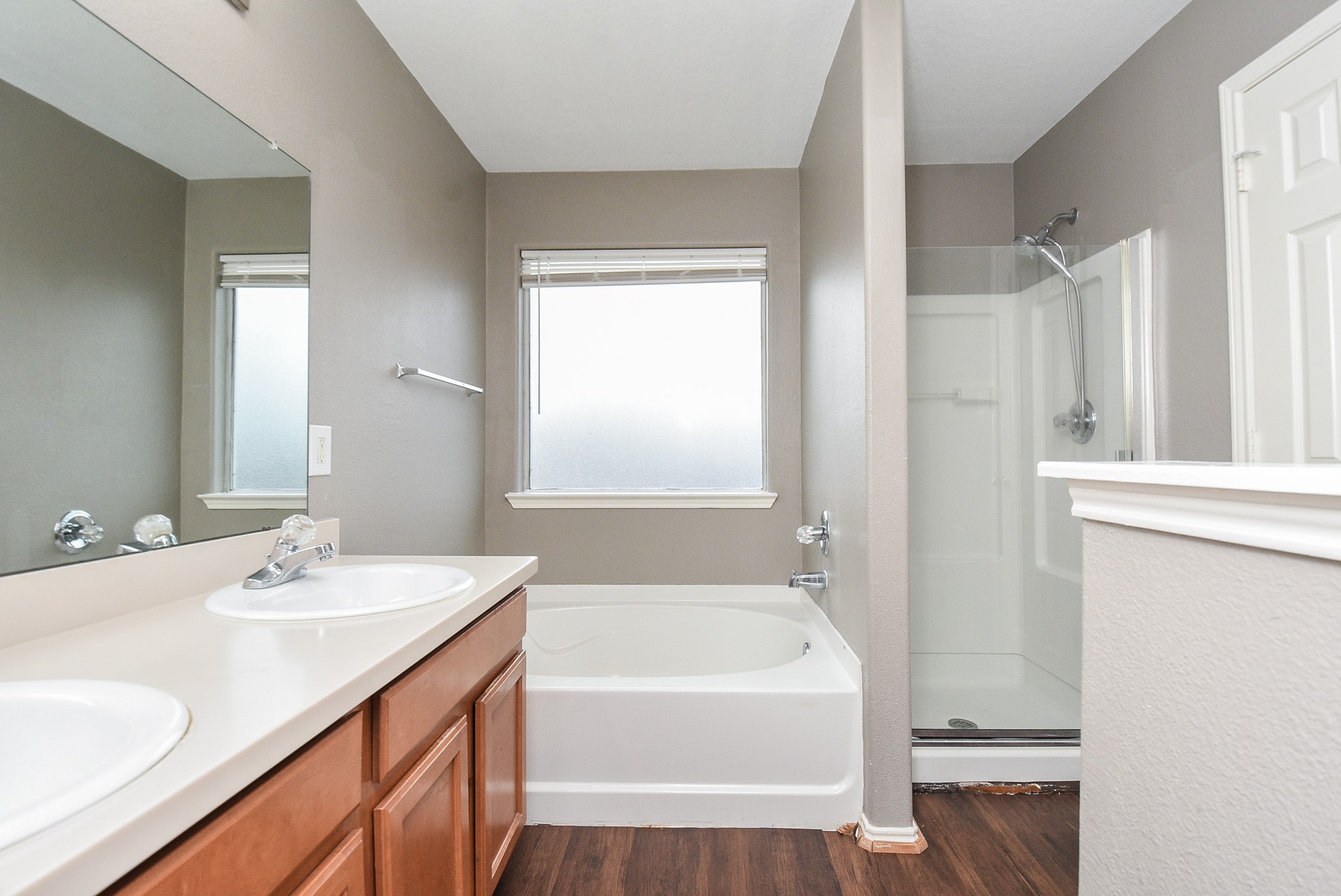 642 Kiley Drive Houston, TX 77073 - Photo 17 of 24 a bathroom with a tub sink and mirror