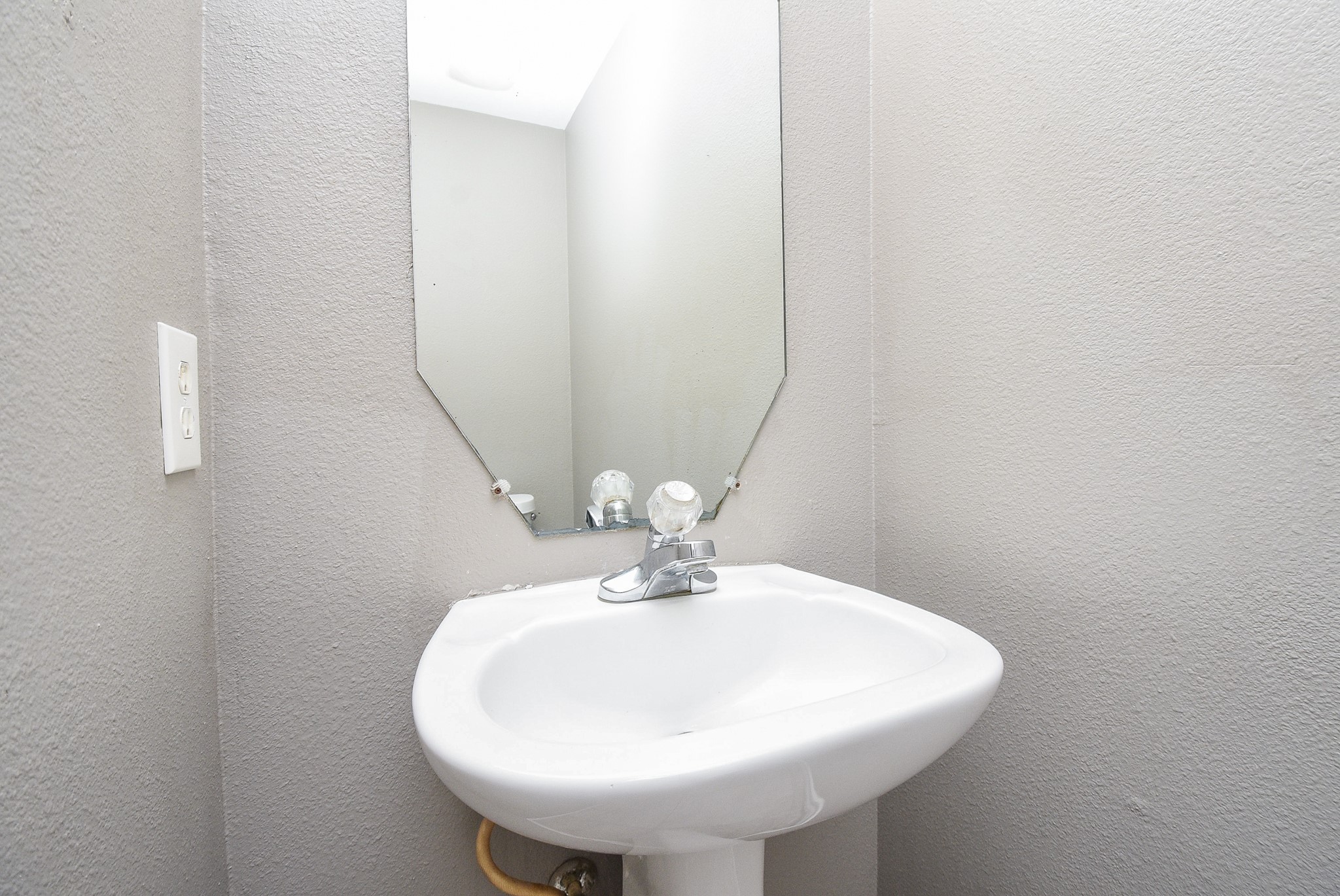 642 Kiley Drive Houston, TX 77073 - Photo 9 of 24 a bathroom with a sink and mirror